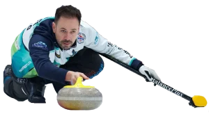 view of John Epping delivering a curling stone with BalancePlus Curling Equipment
